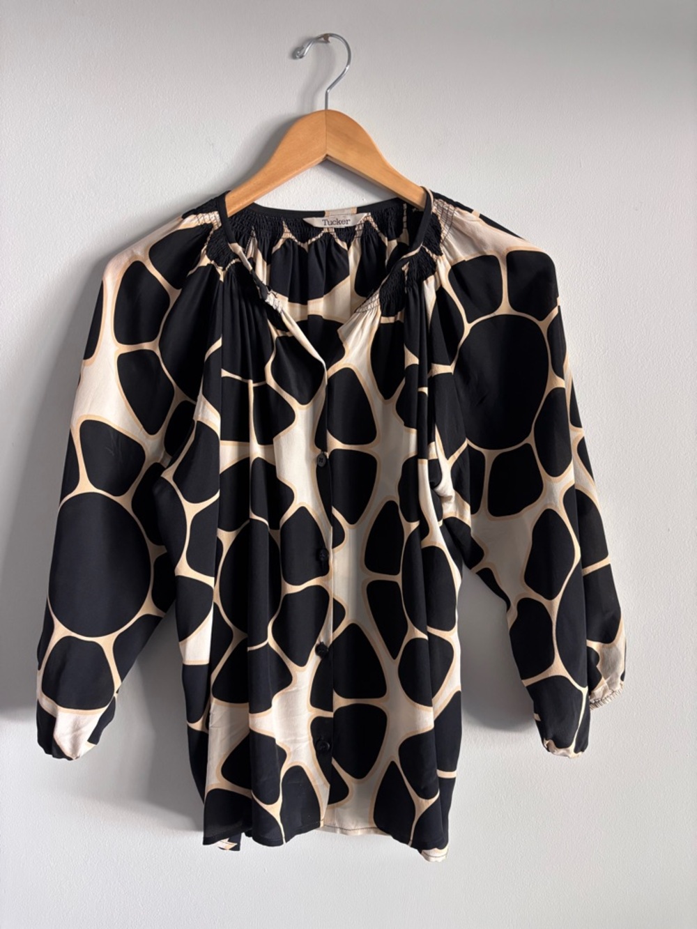 TUCKER NYC  black and cream abstract printed silk blouse.